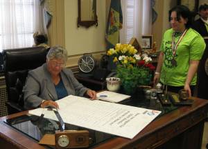 Governor Minner signs the FIRST petition.